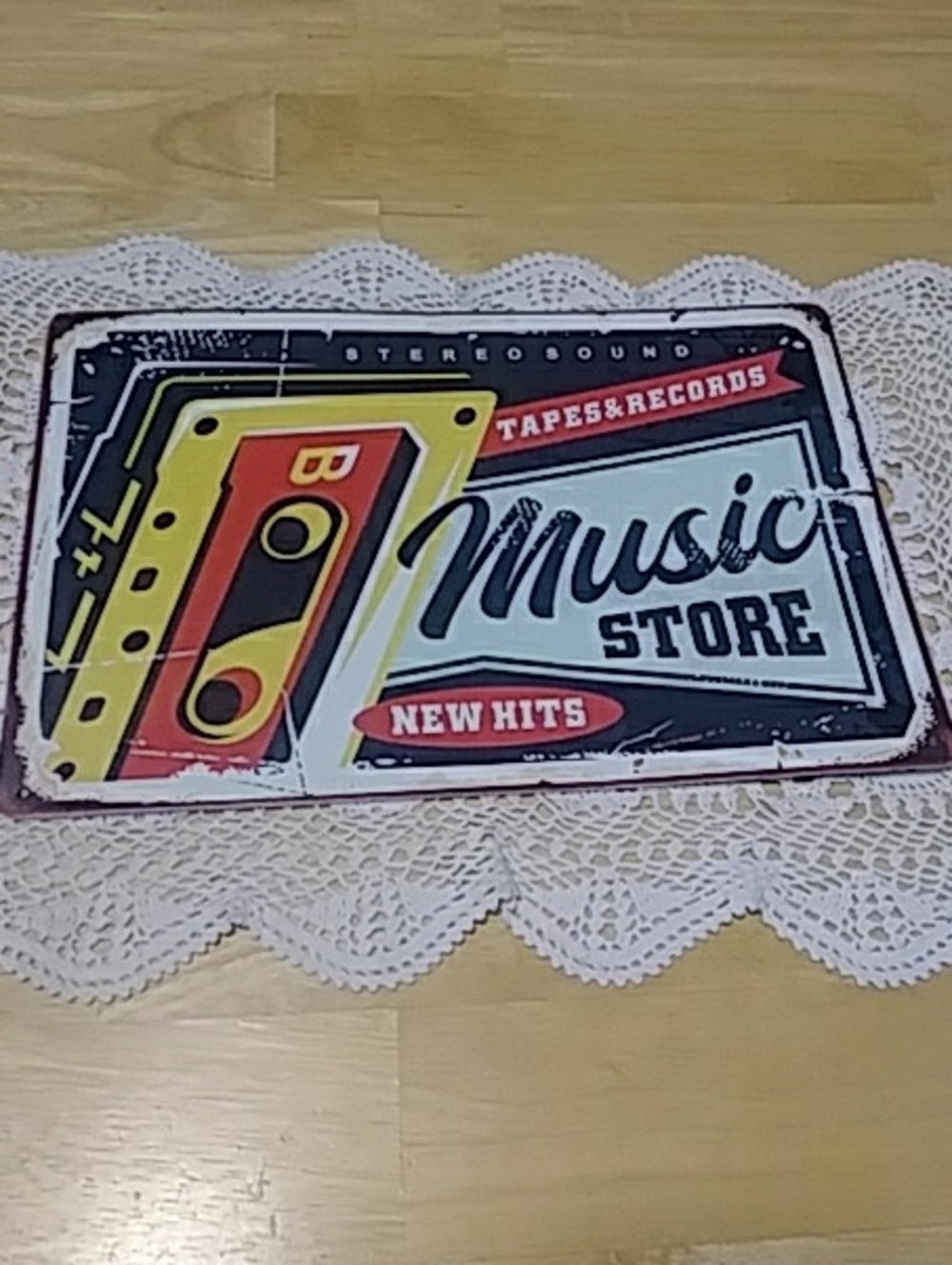 Metal sign with vintage distressed look